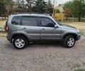 Серый Шевроле Нива, объемом двигателя 1.69 л и пробегом 141 тыс. км за 6000 $, фото 1 на Automoto.ua