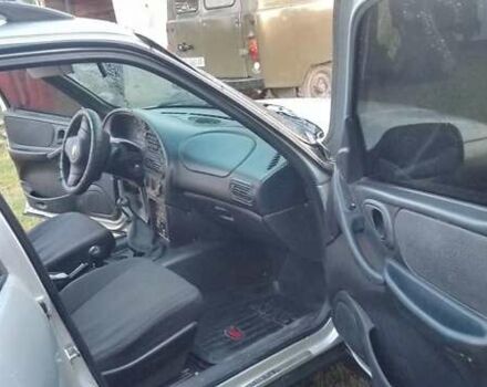 Серый Шевроле Нива, объемом двигателя 1.69 л и пробегом 155 тыс. км за 5200 $, фото 10 на Automoto.ua