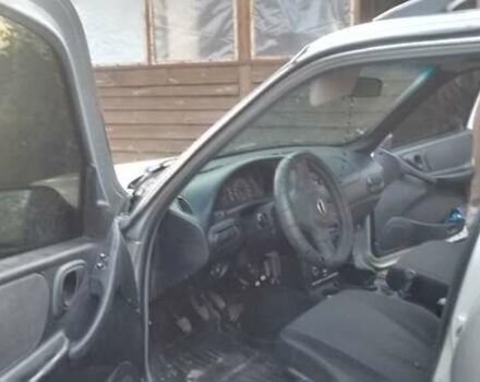 Серый Шевроле Нива, объемом двигателя 1.69 л и пробегом 155 тыс. км за 5200 $, фото 9 на Automoto.ua