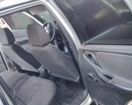 Серый Шевроле Нива, объемом двигателя 1.69 л и пробегом 155 тыс. км за 5200 $, фото 6 на Automoto.ua