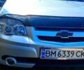 Серый Шевроле Нива, объемом двигателя 1.7 л и пробегом 130 тыс. км за 5300 $, фото 1 на Automoto.ua