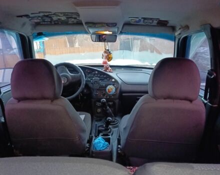 Серый Шевроле Нива, объемом двигателя 1.7 л и пробегом 500 тыс. км за 3500 $, фото 2 на Automoto.ua