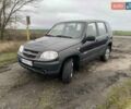 Серый Шевроле Нива, объемом двигателя 1.69 л и пробегом 188 тыс. км за 5700 $, фото 1 на Automoto.ua