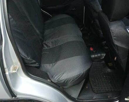 Серый Шевроле Нива, объемом двигателя 1.7 л и пробегом 210 тыс. км за 3500 $, фото 4 на Automoto.ua