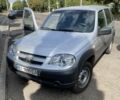 Серый Шевроле Нива, объемом двигателя 1.7 л и пробегом 147 тыс. км за 5600 $, фото 1 на Automoto.ua
