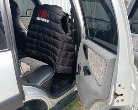 Шевроле Нива 2004 в Первомайск на Automoto.ua Серый Шевроле Нива, объемом двигателя 1.7 л и пробегом 179 тыс. км за 4499 $, фото 1 на Automoto.ua