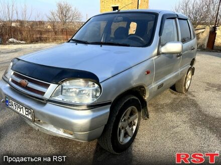 Шевроле Нива 2005 в Компанеевке на Automoto.ua Серый Шевроле Нива, объемом двигателя 1.7 л и пробегом 250 тыс. км за 2400 $, фото 1 на Automoto.ua