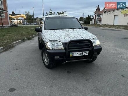 Серый Шевроле Нива, объемом двигателя 1.7 л и пробегом 300 тыс. км за 3750 $, фото 1 на Automoto.ua