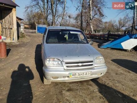 Серый Шевроле Нива, объемом двигателя 1.7 л и пробегом 100 тыс. км за 2500 $, фото 1 на Automoto.ua