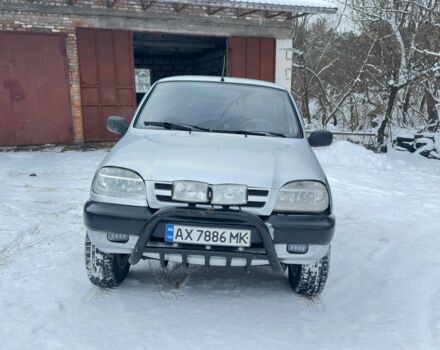 Серый Шевроле Нива, объемом двигателя 1.7 л и пробегом 257 тыс. км за 4000 $, фото 1 на Automoto.ua