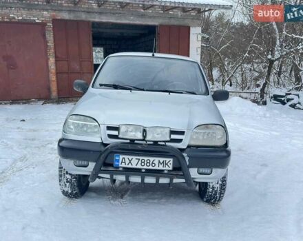 Серый Шевроле Нива, объемом двигателя 1.69 л и пробегом 224 тыс. км за 4000 $, фото 1 на Automoto.ua