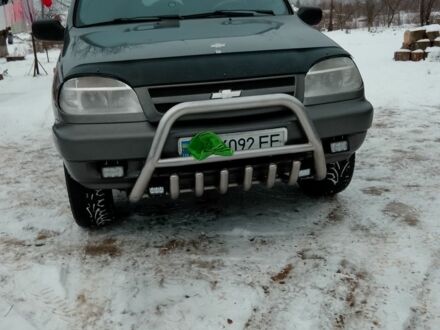 Сірий Шевроле Нива, об'ємом двигуна 1 л та пробігом 128 тис. км за 3950 $, фото 1 на Automoto.ua