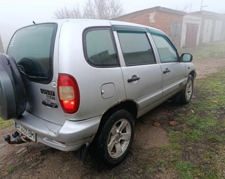 Серый Шевроле Нива, объемом двигателя 1.7 л и пробегом 158 тыс. км за 3000 $, фото 1 на Automoto.ua