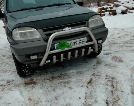 Серый Шевроле Нива, объемом двигателя 1 л и пробегом 136 тыс. км за 3950 $, фото 1 на Automoto.ua