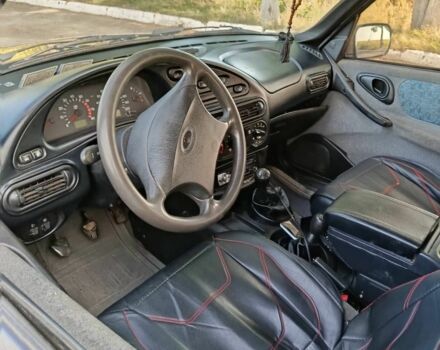 Синій Шевроле Нива, об'ємом двигуна 1.7 л та пробігом 255 тис. км за 3342 $, фото 5 на Automoto.ua