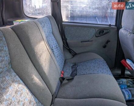 Синий Шевроле Нива, объемом двигателя 1.7 л и пробегом 244 тыс. км за 2300 $, фото 1 на Automoto.ua