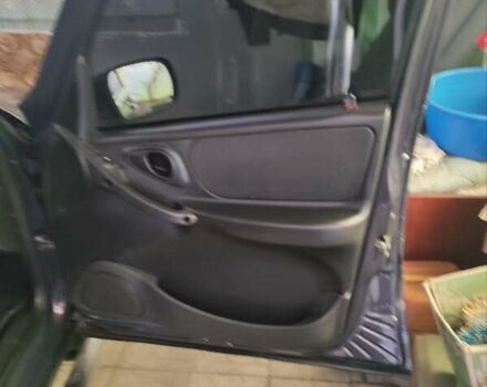 Синий Шевроле Нива, объемом двигателя 1.69 л и пробегом 90 тыс. км за 8800 $, фото 2 на Automoto.ua