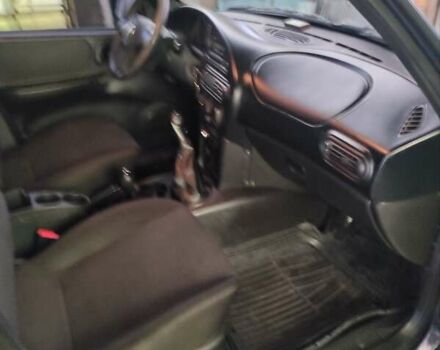 Синий Шевроле Нива, объемом двигателя 1.69 л и пробегом 90 тыс. км за 8800 $, фото 1 на Automoto.ua