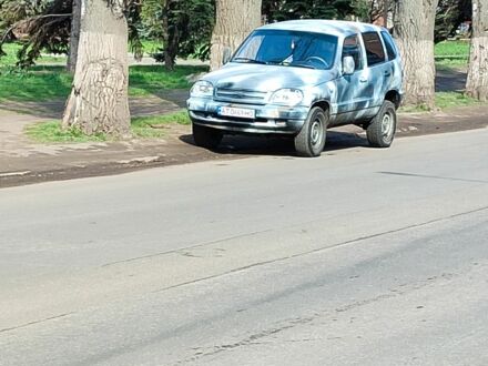 Синий Шевроле Нива, объемом двигателя 1.7 л и пробегом 196 тыс. км за 1200 $, фото 1 на Automoto.ua
