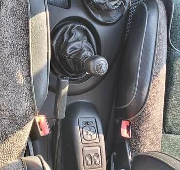 Зелений Шевроле Нива, об'ємом двигуна 1.69 л та пробігом 116 тис. км за 4600 $, фото 10 на Automoto.ua