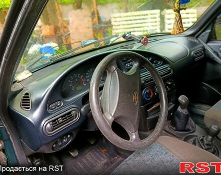 Зелений Шевроле Нива, об'ємом двигуна 1.7 л та пробігом 160 тис. км за 3500 $, фото 4 на Automoto.ua