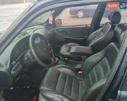 Зеленый Шевроле Нива, объемом двигателя 1.7 л и пробегом 233 тыс. км за 3000 $, фото 3 на Automoto.ua