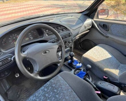 Зеленый Шевроле Нива, объемом двигателя 1.7 л и пробегом 320 тыс. км за 2250 $, фото 8 на Automoto.ua