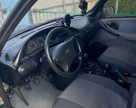 Зелений Шевроле Нива, об'ємом двигуна 1.8 л та пробігом 200 тис. км за 3800 $, фото 5 на Automoto.ua