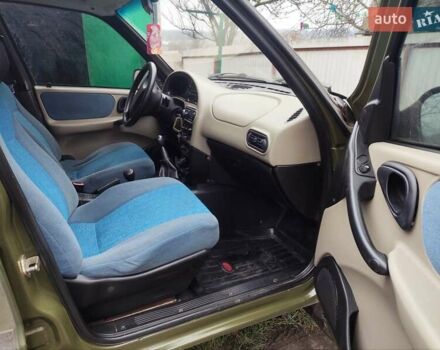 Зеленый Шевроле Нива, объемом двигателя 1.7 л и пробегом 310 тыс. км за 4000 $, фото 4 на Automoto.ua