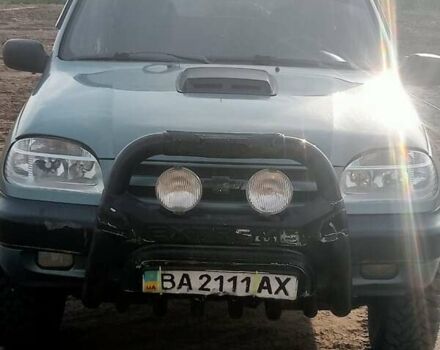 Зеленый Шевроле Нива, объемом двигателя 1.69 л и пробегом 244 тыс. км за 3200 $, фото 1 на Automoto.ua