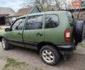 Зеленый Шевроле Нива, объемом двигателя 1.7 л и пробегом 310 тыс. км за 4000 $, фото 2 на Automoto.ua