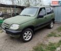 Зеленый Шевроле Нива, объемом двигателя 1.7 л и пробегом 310 тыс. км за 4000 $, фото 1 на Automoto.ua