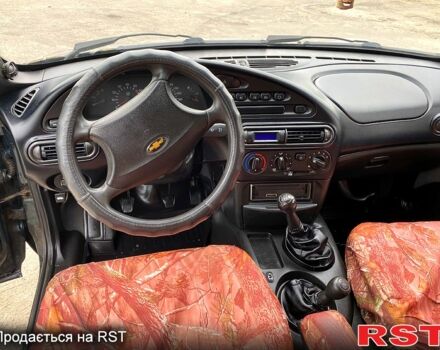 Зеленый Шевроле Нива, объемом двигателя 1.7 л и пробегом 263 тыс. км за 4700 $, фото 4 на Automoto.ua