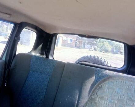 Зеленый Шевроле Нива, объемом двигателя 1.69 л и пробегом 244 тыс. км за 3200 $, фото 4 на Automoto.ua