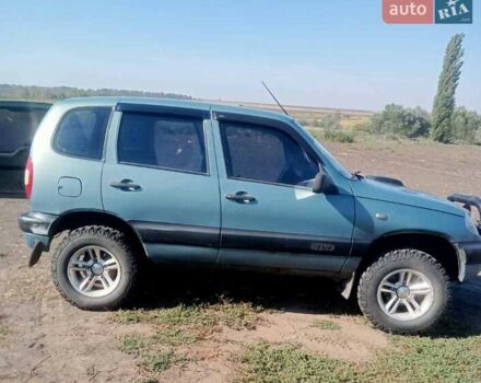 Зеленый Шевроле Нива, объемом двигателя 1.69 л и пробегом 244 тыс. км за 3200 $, фото 2 на Automoto.ua