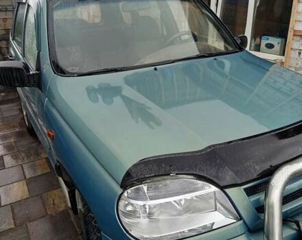 Зеленый Шевроле Нива, объемом двигателя 1.69 л и пробегом 254 тыс. км за 3500 $, фото 1 на Automoto.ua