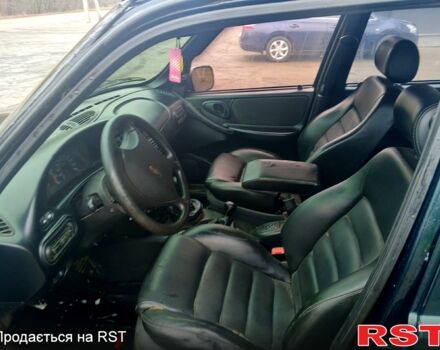 Зеленый Шевроле Нива, объемом двигателя 1.7 л и пробегом 227 тыс. км за 3000 $, фото 2 на Automoto.ua