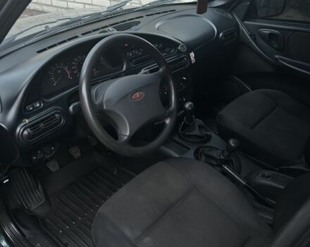 Зеленый Шевроле Нива, объемом двигателя 1.7 л и пробегом 230 тыс. км за 3335 $, фото 3 на Automoto.ua