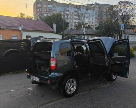 Зеленый Шевроле Нива, объемом двигателя 1.69 л и пробегом 88 тыс. км за 5800 $, фото 2 на Automoto.ua