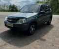 Зеленый Шевроле Нива, объемом двигателя 1.7 л и пробегом 140 тыс. км за 5199 $, фото 1 на Automoto.ua