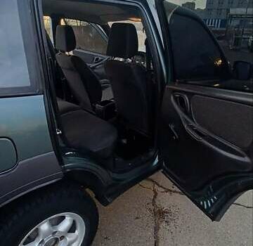 Зеленый Шевроле Нива, объемом двигателя 1.69 л и пробегом 142 тыс. км за 6500 $, фото 4 на Automoto.ua