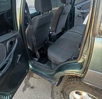 Зеленый Шевроле Нива, объемом двигателя 1.69 л и пробегом 142 тыс. км за 6500 $, фото 3 на Automoto.ua