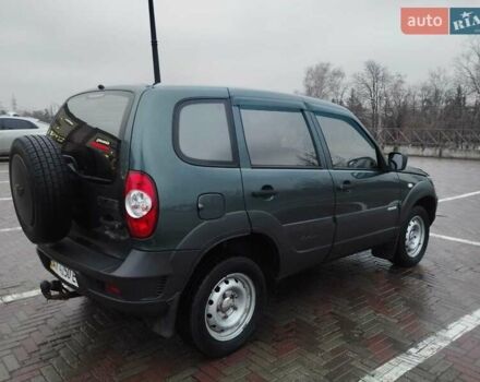Зеленый Шевроле Нива, объемом двигателя 1.69 л и пробегом 103 тыс. км за 6900 $, фото 3 на Automoto.ua