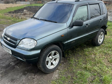 Зеленый Шевроле Нива, объемом двигателя 1.69 л и пробегом 120 тыс. км за 4900 $, фото 1 на Automoto.ua