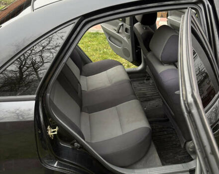 Черный Шевроле Нубира, объемом двигателя 1.8 л и пробегом 221 тыс. км за 4700 $, фото 17 на Automoto.ua