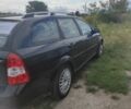 Черный Шевроле Нубира, объемом двигателя 1.8 л и пробегом 205 тыс. км за 4000 $, фото 2 на Automoto.ua
