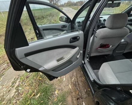 Черный Шевроле Нубира, объемом двигателя 2 л и пробегом 245 тыс. км за 5100 $, фото 4 на Automoto.ua