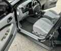 Черный Шевроле Нубира, объемом двигателя 1.6 л и пробегом 175 тыс. км за 5197 $, фото 19 на Automoto.ua