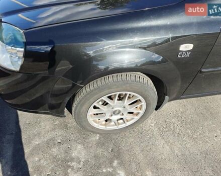 Черный Шевроле Нубира, объемом двигателя 1.99 л и пробегом 237 тыс. км за 6500 $, фото 33 на Automoto.ua