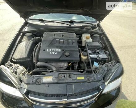 Черный Шевроле Нубира, объемом двигателя 1.6 л и пробегом 225 тыс. км за 5000 $, фото 22 на Automoto.ua